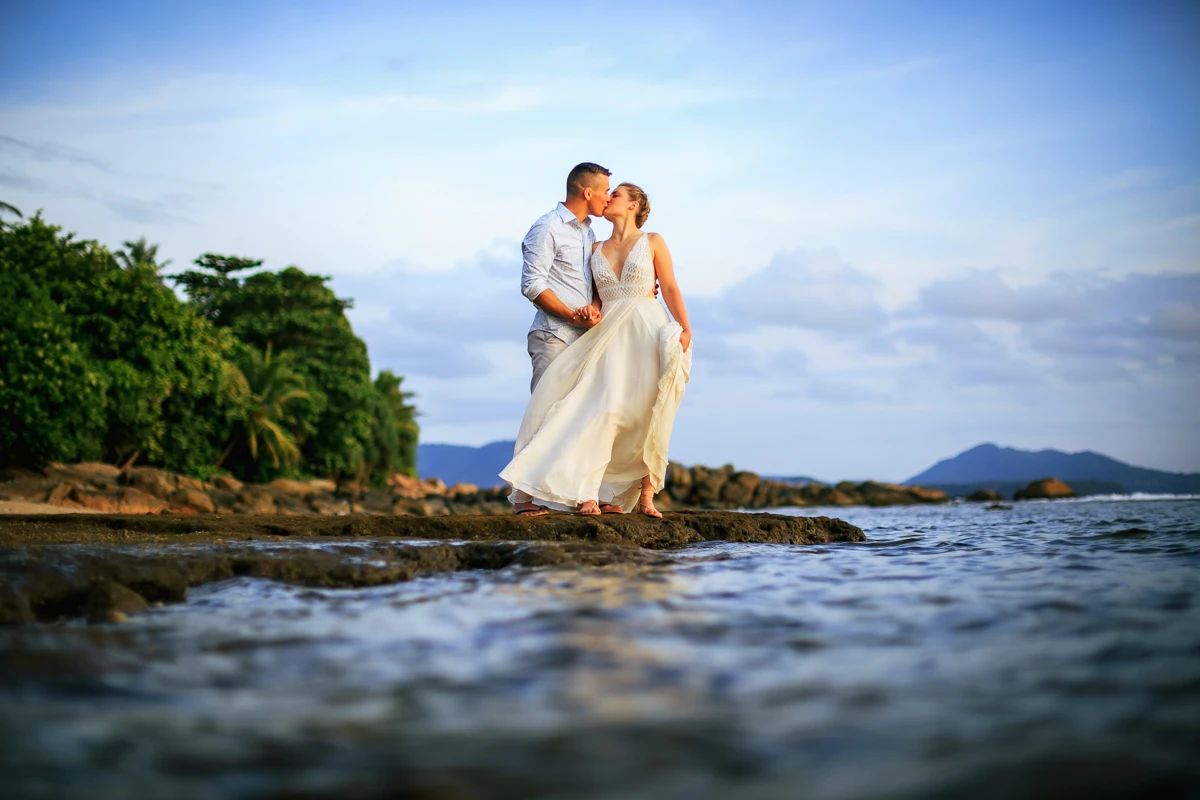 Couple and Honeymoon photography of Jame and Agnes at Trisara hotel, Phuket beach during golden light